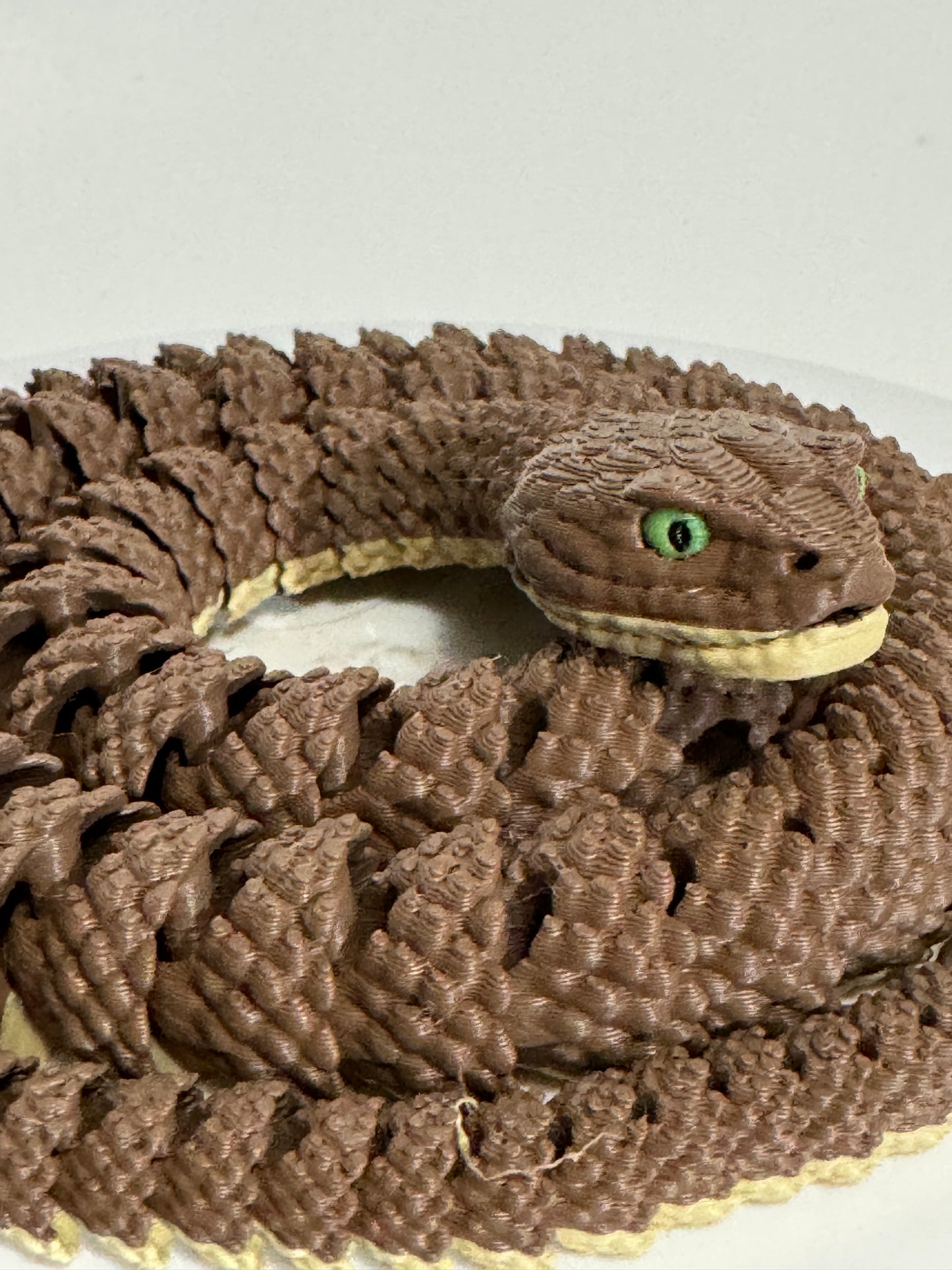 Articulated rattle snake